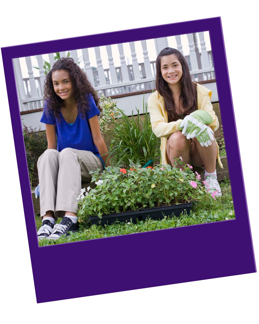 Smiling girls wearing gardening gloves posed in a garden with tray of flowers in front of them. A purple border surrounds the photo.